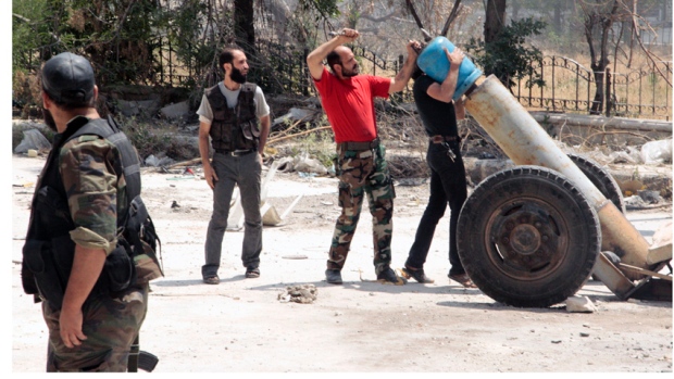 syrian rebels fire mortar