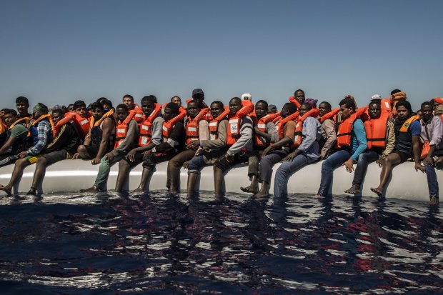 On driver African boat refugees
